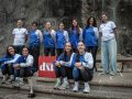 Jugadoras y cuerpo técnico del Ciudad de A Coruña posan junto al trofeo de subcampeonas de Primera Nacional y el logo de DXT Campeón  | Quintana