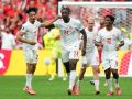 Promise David celebra el segundo gol canadiense, que llevó su firma