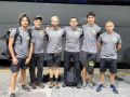 El entrenador del Zalaeta David Hermida, cuarto por la izquierda, a su llegada a Venezuela junto a sus compañeros
