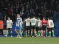 El Tourmalet de enero le sale a deber al Deportivo Mella lamenta el gol del Racing mientras los futbolistas del equipo cántabro celebran sobre el césped de Riazor