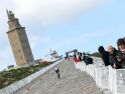 Imagen de la llegada a la Torre de Hércules en la contrarreloj que abrió la edición de 2024, cuyos tiempos no contaron la clasificación general debido al fuerte viento reinante