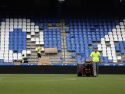 Operarios y jardineros trabajando en Riazor este martes para recuperar el estadio para el partido del jueves entre España e Irak