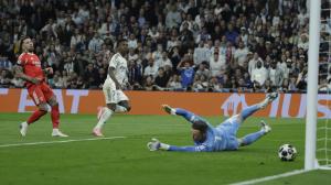 Vinícius bate a Trubin para certificar la victoria del Real Madrid ante el Benfica y su pase a los octavos de final de la Champions