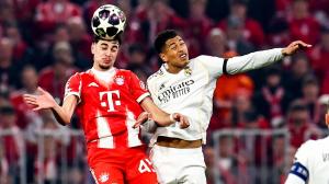 Duelo entre Aleksandar Pavlovic y Jude Bellingham en el duelo de vuelta de cuartos de final de la Champions League entre Bayern y Real Madrid