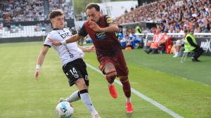 Giacomo Quagliata sortea a David González en el partido ante el Burgos