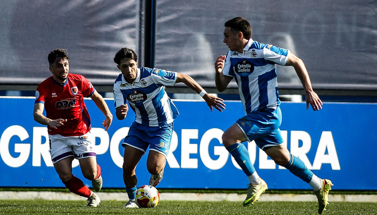 Fabi y Nájera en un lance del juego en el encuentro entre Numancia y Fabril