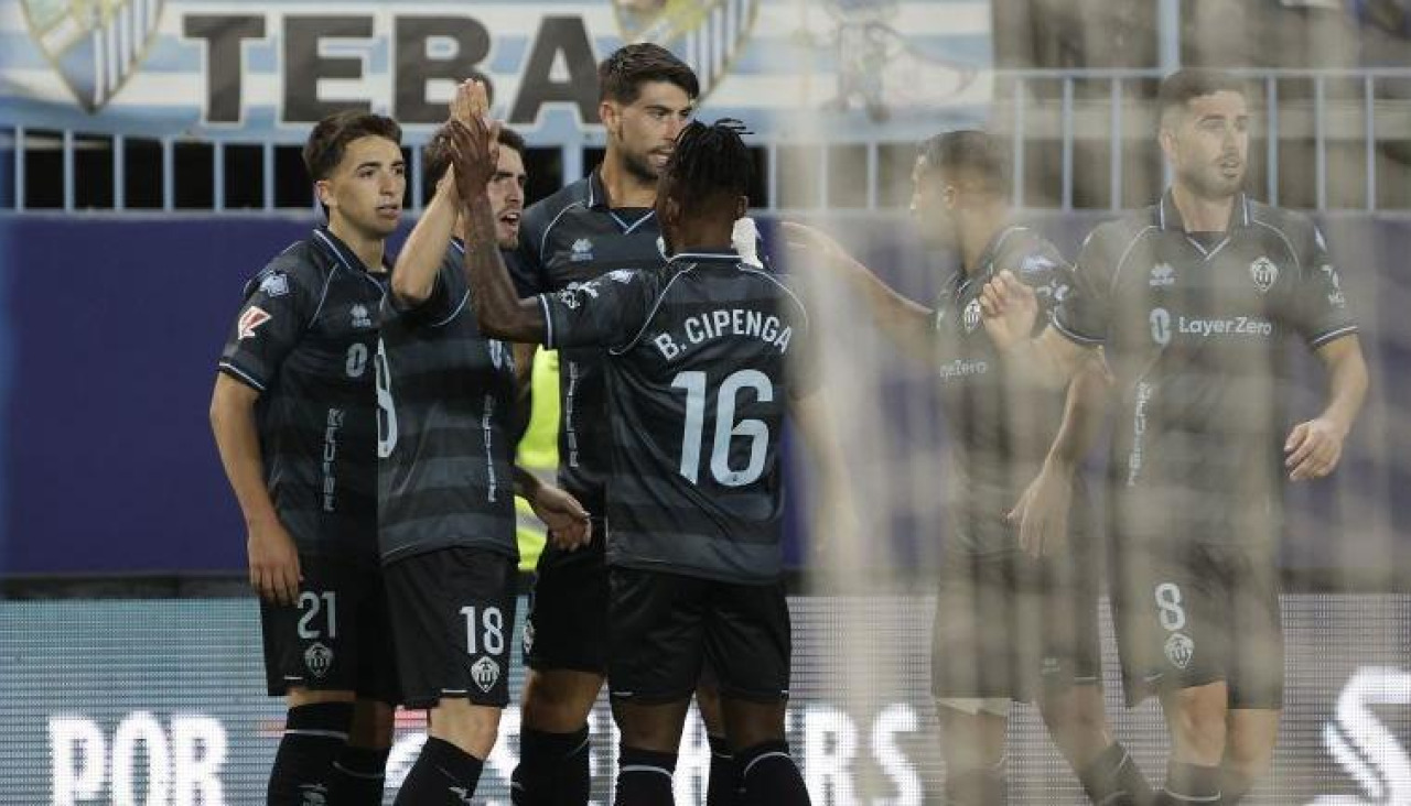 Los futbolistas del Castellón celebran uno de sus tres goles en Málaga (2-3)