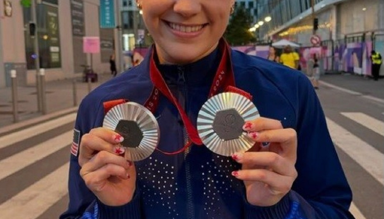Ali Truwit con sus medallas